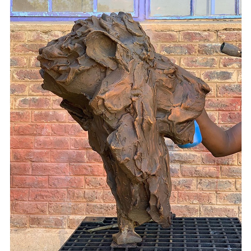 lion head brass sculpture