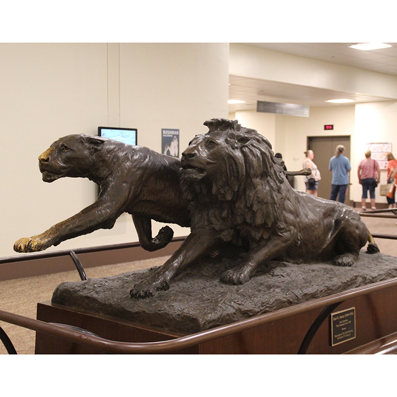 lion and leopard statue