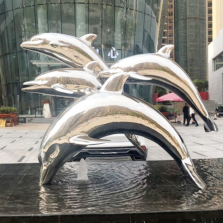 Mirror polished dolphin sculpture