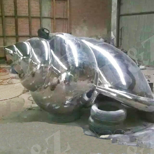 Mirror polished snail sculpture