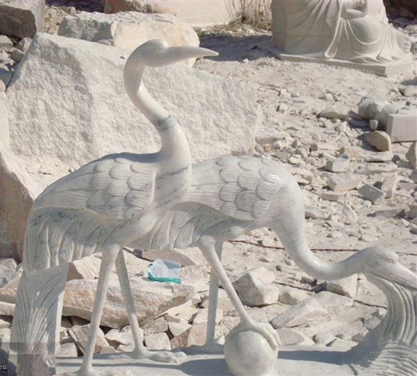 white crane sculpture