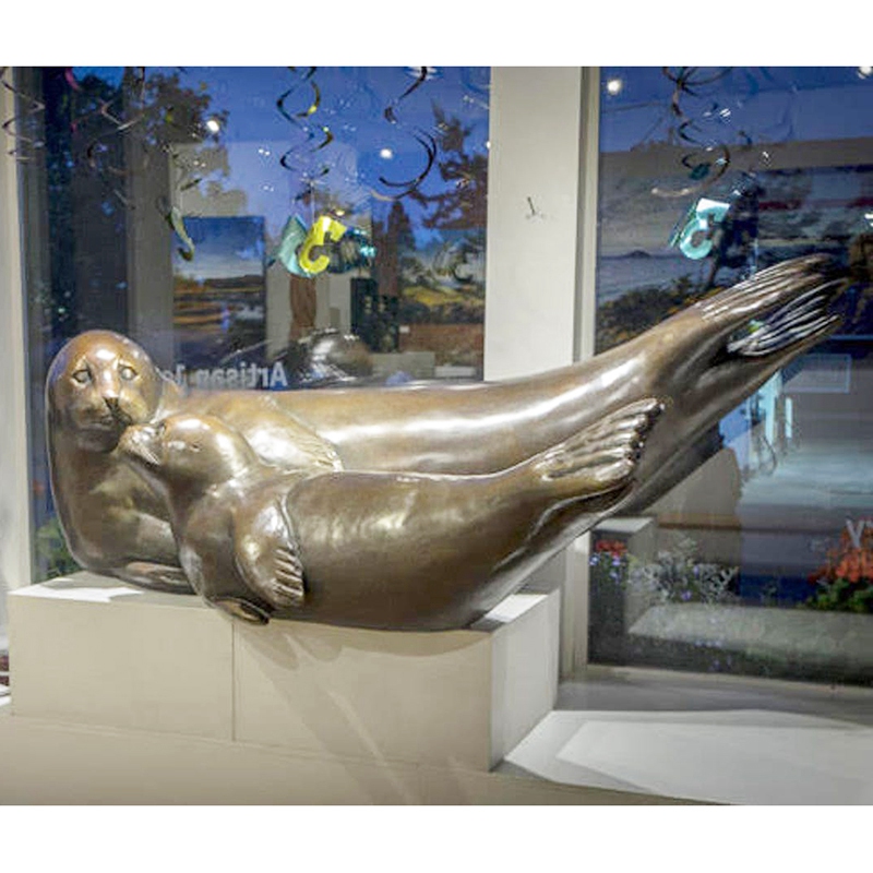 bronze sea dog statues