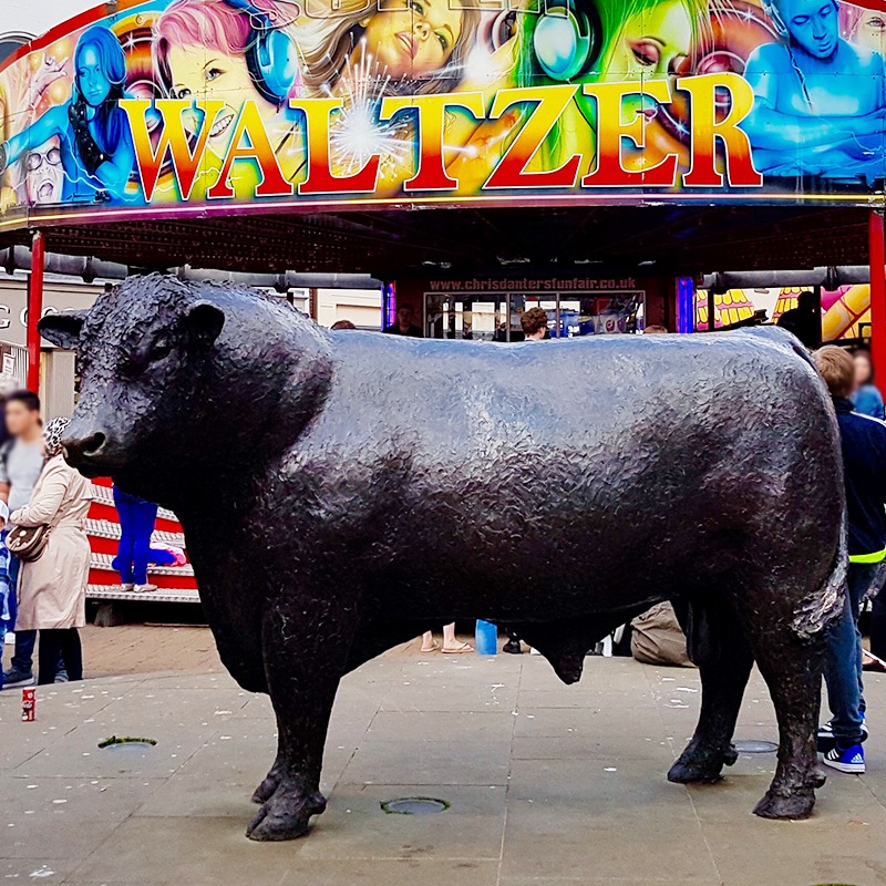 brozen cow sculpture