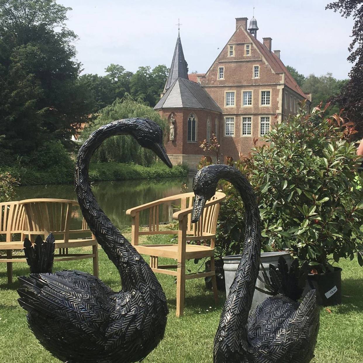 swan metal sculpture couples statues