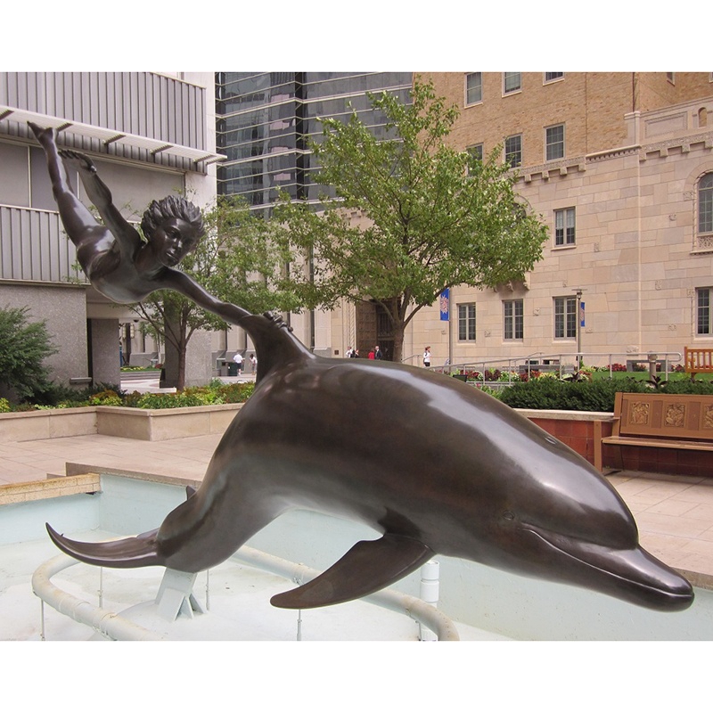 boy dolphin fountain sculpture