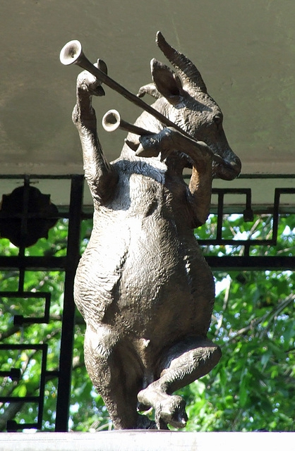 Antelope playing instrument statue