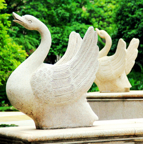 Swan fountain stone sculptures