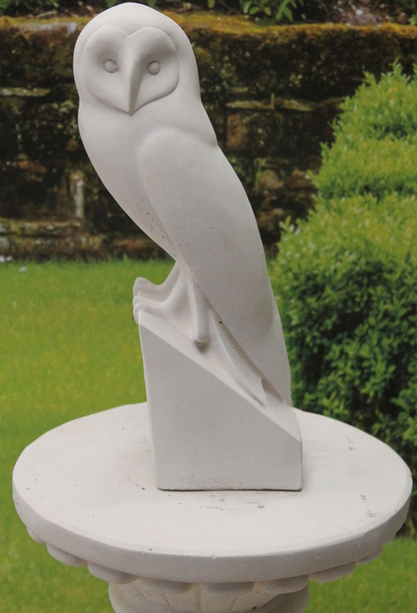 Garden bird stone sculpture