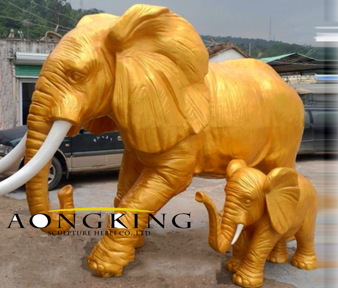 gold elephant statues
