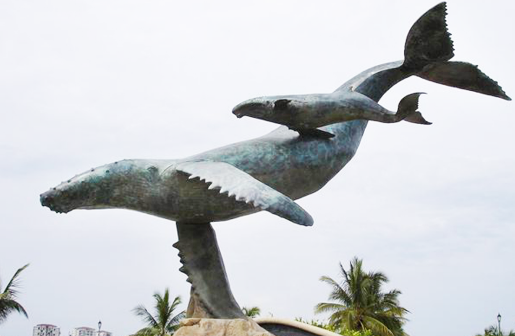 Large Swimming Bronze Minke Whale Statue in the Air