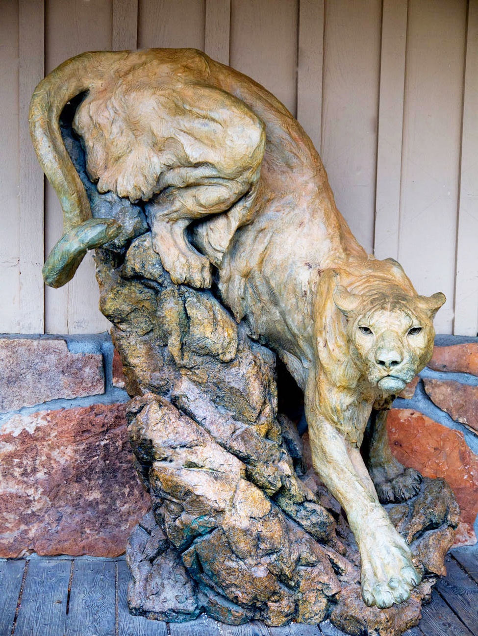 Mountain female lion statue for landscape