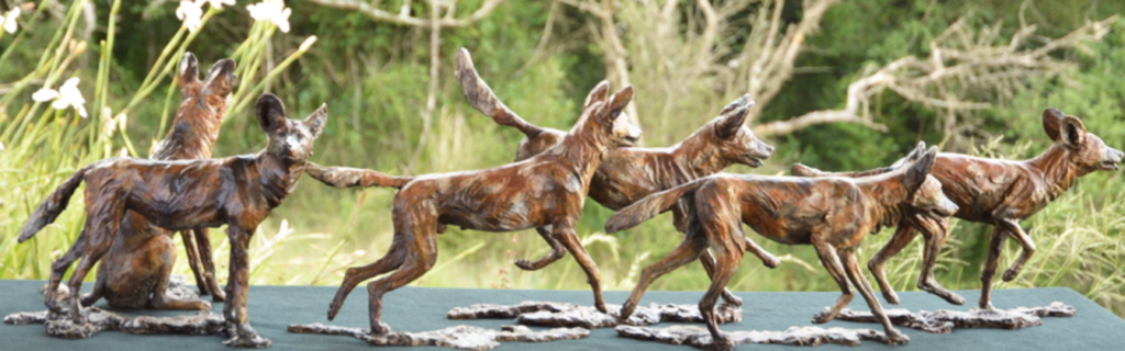 african wild dog sculpture
