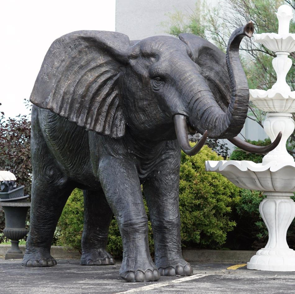 bronze elephant trunk up