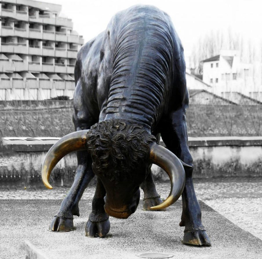 bowed bull statue