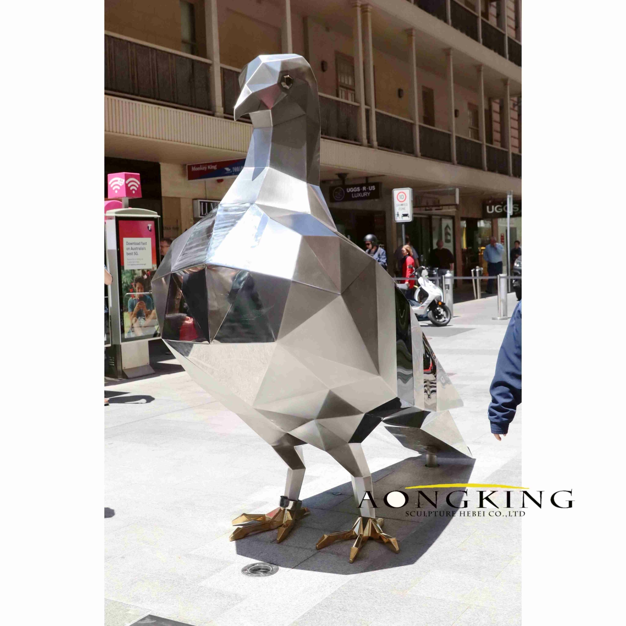 metal geometric pigeon statue