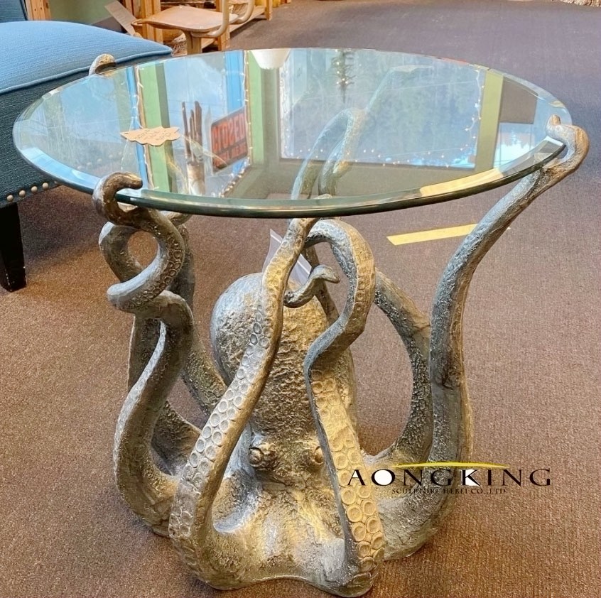 bronze octopus base with glass tabletop