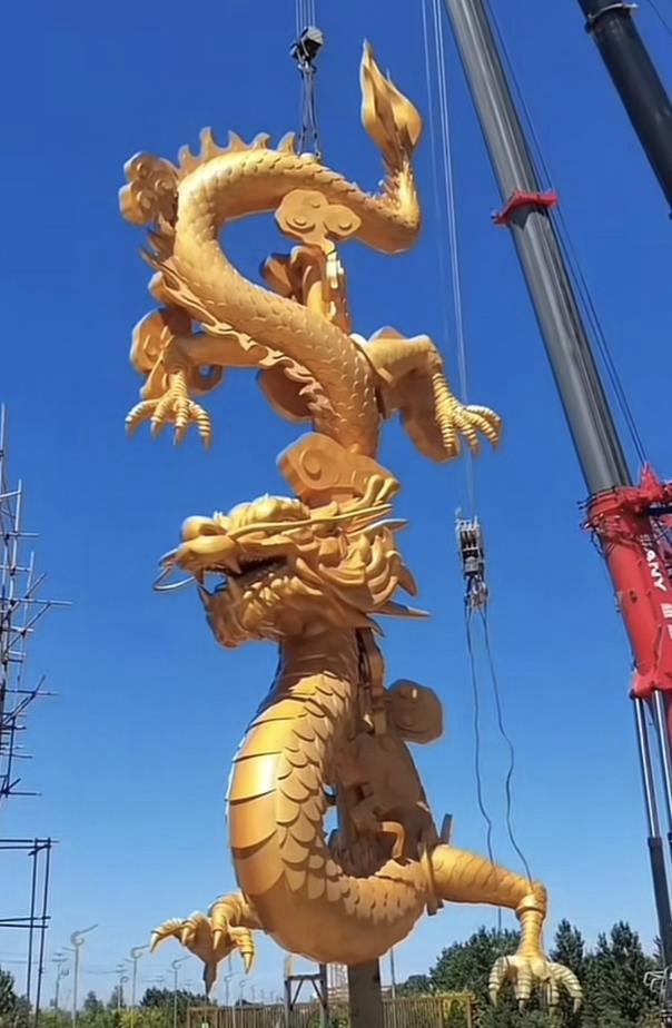 installed gold dragon sculpture