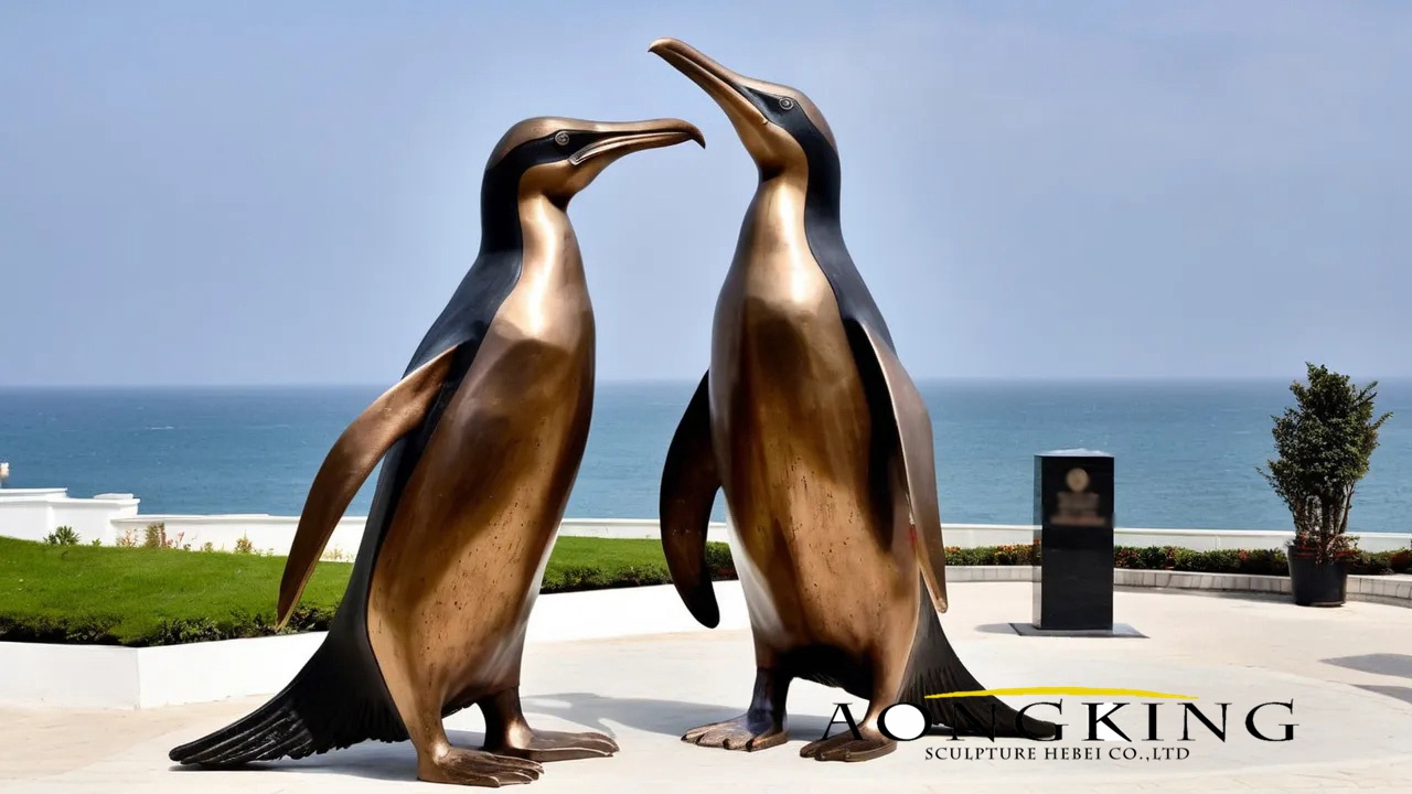 crested penguin sculptures